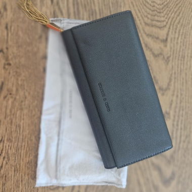 Black leather zip-around wallet