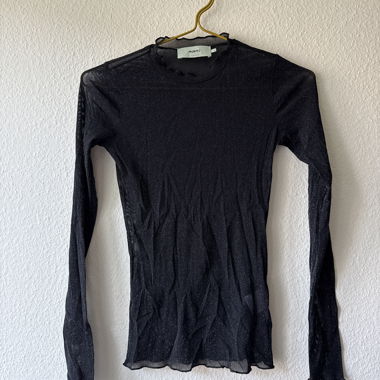 Leicht glitzerndes transparentes T-Shirt