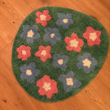 Tapis rond à fleurs vert