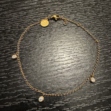 PURELEI gold bracelet with charms