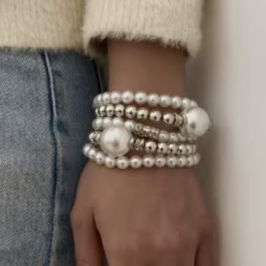 Multi-strand bracelet with white beads