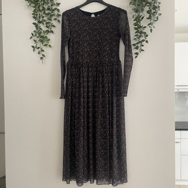 black dress with floral details