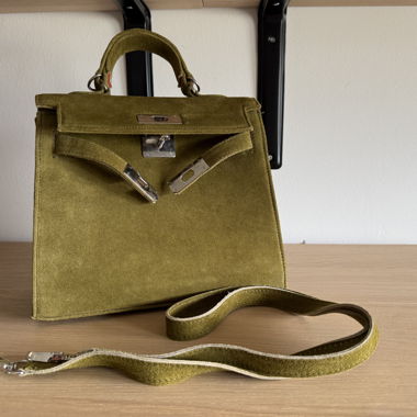 Green suede handbag