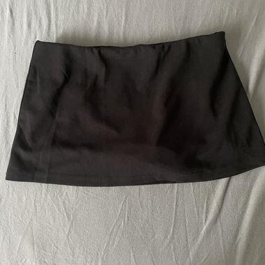 Brand new Mini black skirt -with shorts attached 