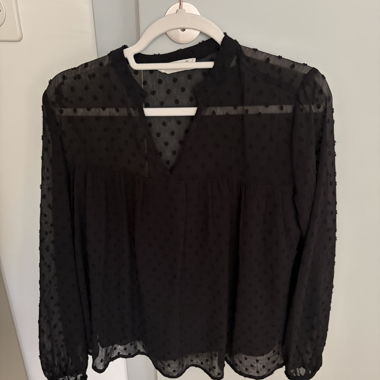 Blusa nera trasparente