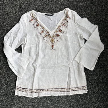 Embroidered white linen blouse