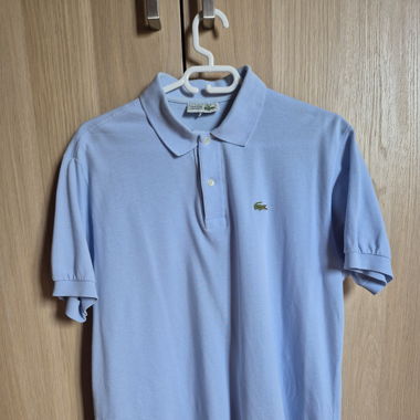 Polo Lacoste bleu clair 