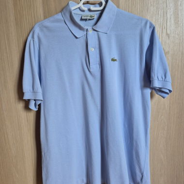 Polo Lacoste azzurro chiaro