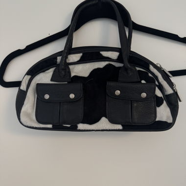 Borsa nera e bianca effetto pelle di mucca