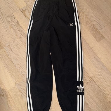Black Adidas tracksuit bottoms