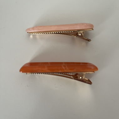 Set of 2 hair clips in pink and orange