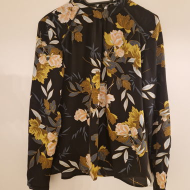 Blusa con motivo floreale