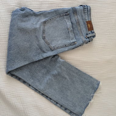 Jeans a zampa corti cropped azzurri