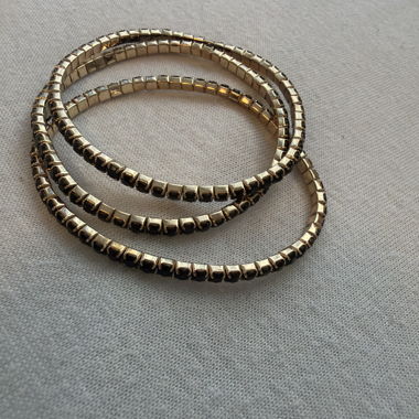 3 bracciali color oro