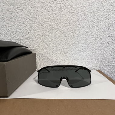Rick Owens shielding sunglasses