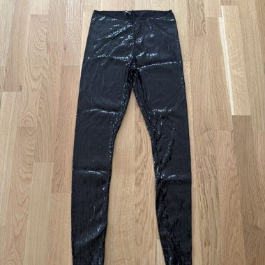Pantaloni leggings con paillettes nere