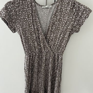 Beautiful brown dress with white flowers.