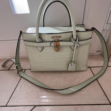 Guess light teal bag with wallet