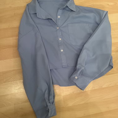 Blue blouse with button placket