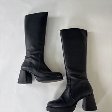 Bottes noires mi-cuisse à talons