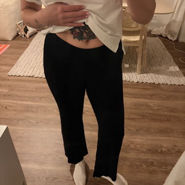 Pantaloni a zampa in maglia