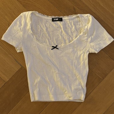 Top da donna bianco con pizzo