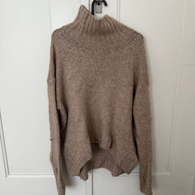 Beige knitted sweater