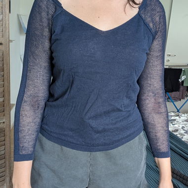 Navy blue sweater with mesh sleeves