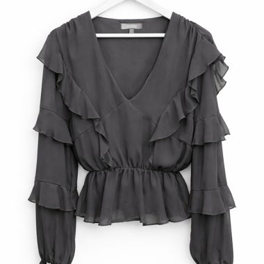 Blusa nera con volant peplum e scollo a V