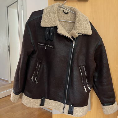 Veste en cuir avec fourrure
