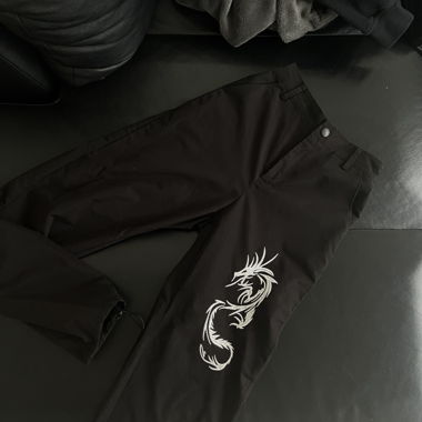 black pants with dragon
