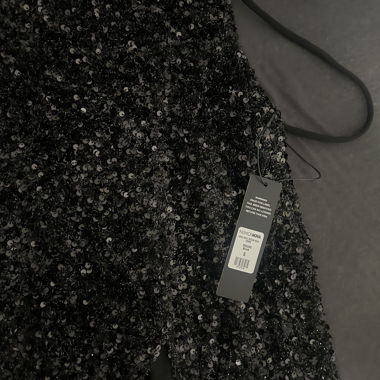 Robe longue à paillettes avec fente
