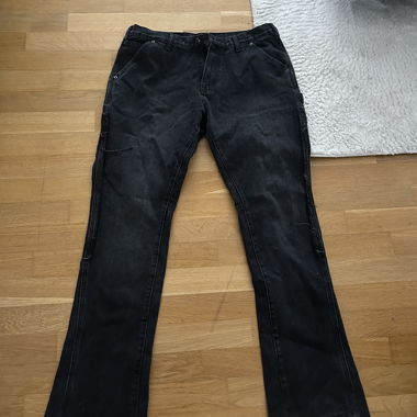 Jeans a zampa nera distressed