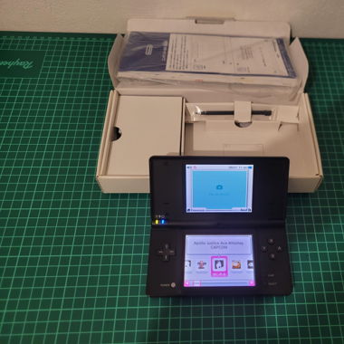 Nintendo Dsi in box with games installed 