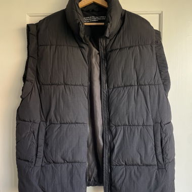 Black quilted oversized puffer vest