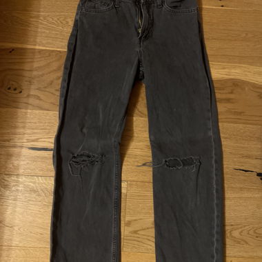 Jeans neri strappati