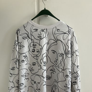 Pullover mit gesichter