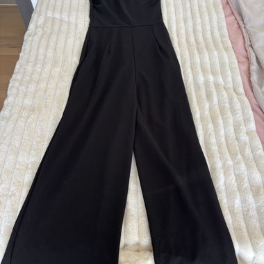 Schwarzer Overall mit Monospalla