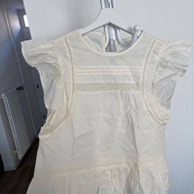 Cream-coloured blouse with ruffles, size S