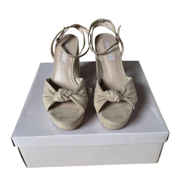 Tacchi alti beige con plateau