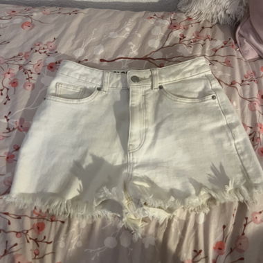 High-waisted white denim shirt