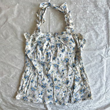 “Bonsoir” floral ruffled halter top