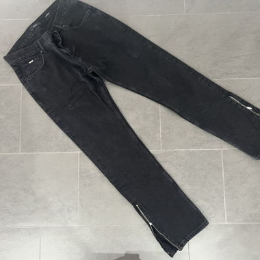 Jeans noirs à fermeture éclair