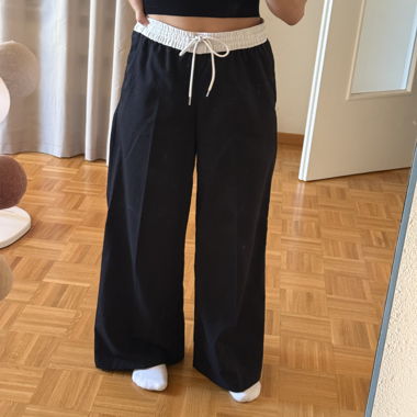 Pantalone tailleur nero con fodera bianca