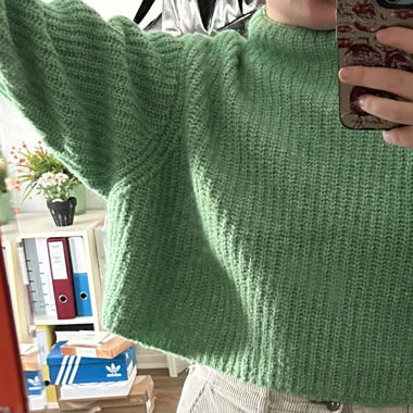 green wool sweater