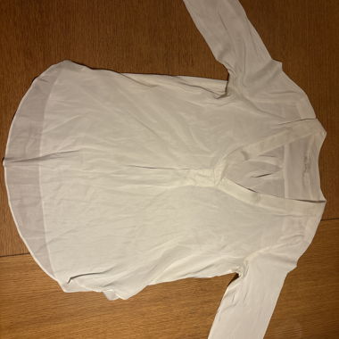 Blusa bianca a maniche lunghe