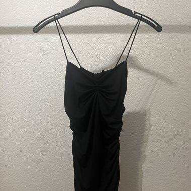 Mini robe noire moulante - Taille S - État neuf!