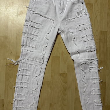 White distressed denim jeans