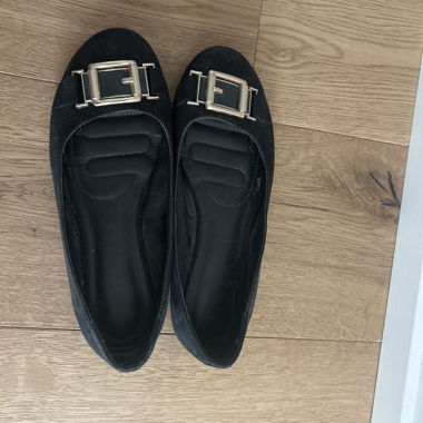Black buckle flats