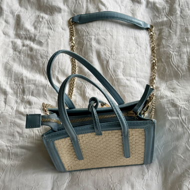 Small raffia handbag with chain strap